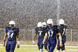 It's raining, it's pouring Farmersville Farmers return to the bench in a driving rain storm last Friday during a District 5-3A Div. I contest against visiting Callisburg. The Farmers remainedd winless in district following the 43-22 loss. For the full story and additional photos see this weeks Sports.
