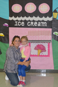Librarian Amy Schkade and Bentley Cox share time at the "ice cream parlor" for 50s day at Tatum.