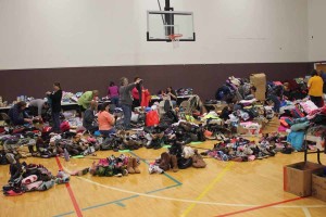 Volunteers of all ages help at the Multi-agency Disaster Relief Center at First Baptist Church of Farmersville Dec. 30.