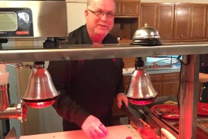 Darin Jordan, co-owner of Jordan’s Bar-b-cue, prepares freshly smoked meat at the eatery’s soft opening Jan. 30. Darin owns the restaurant along with his wife Jamie and it is located in downtown Farmersville.