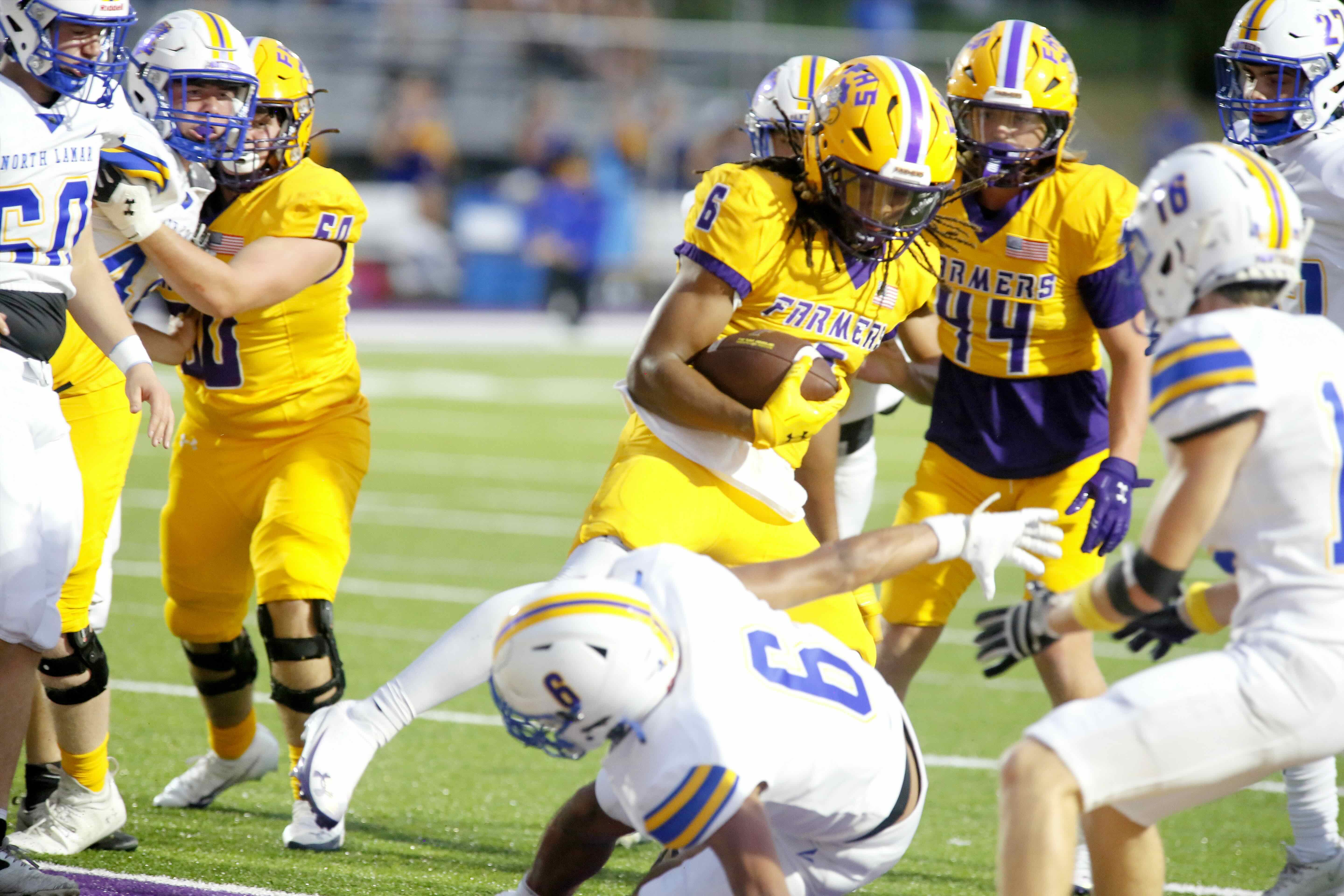 Farmers dominate North Lamar in weather-shortened game