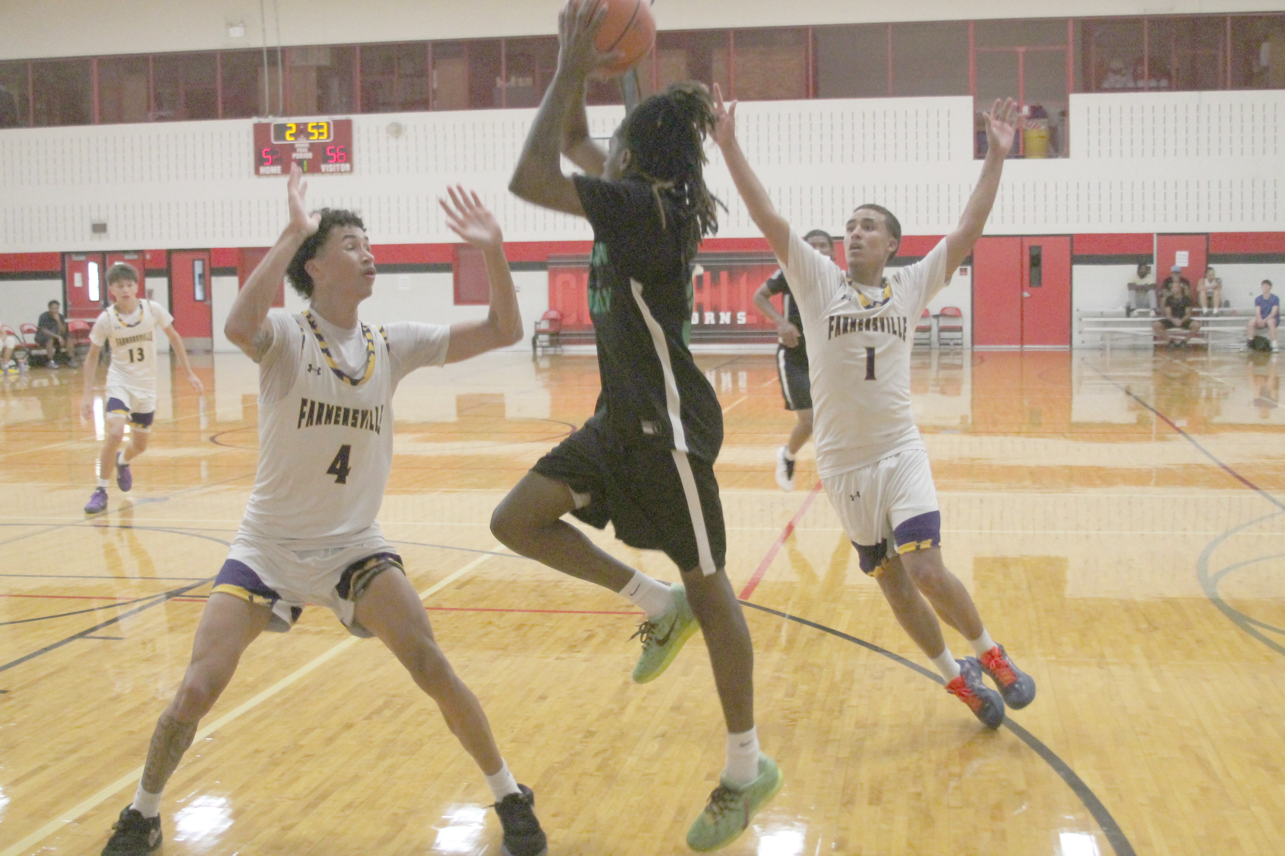 Farmersville boys hoops team holds ground against two state champs