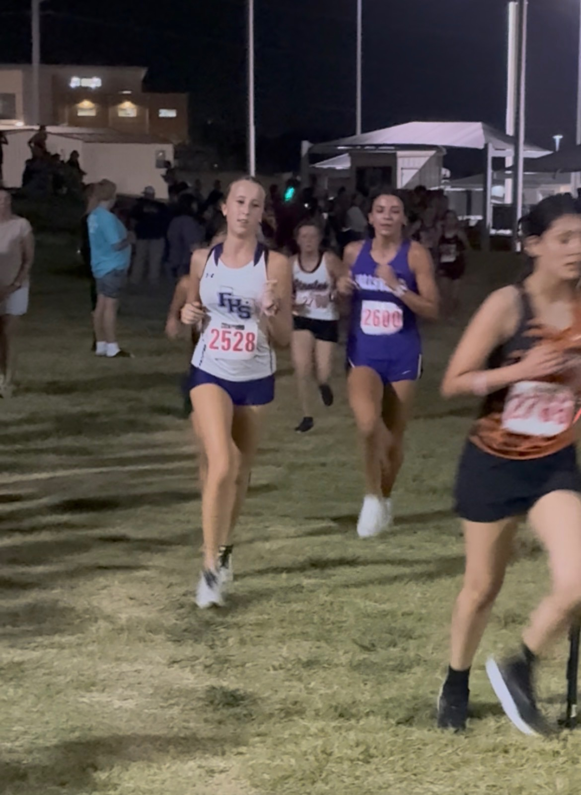 Farmersville runs under the lights in Wylie