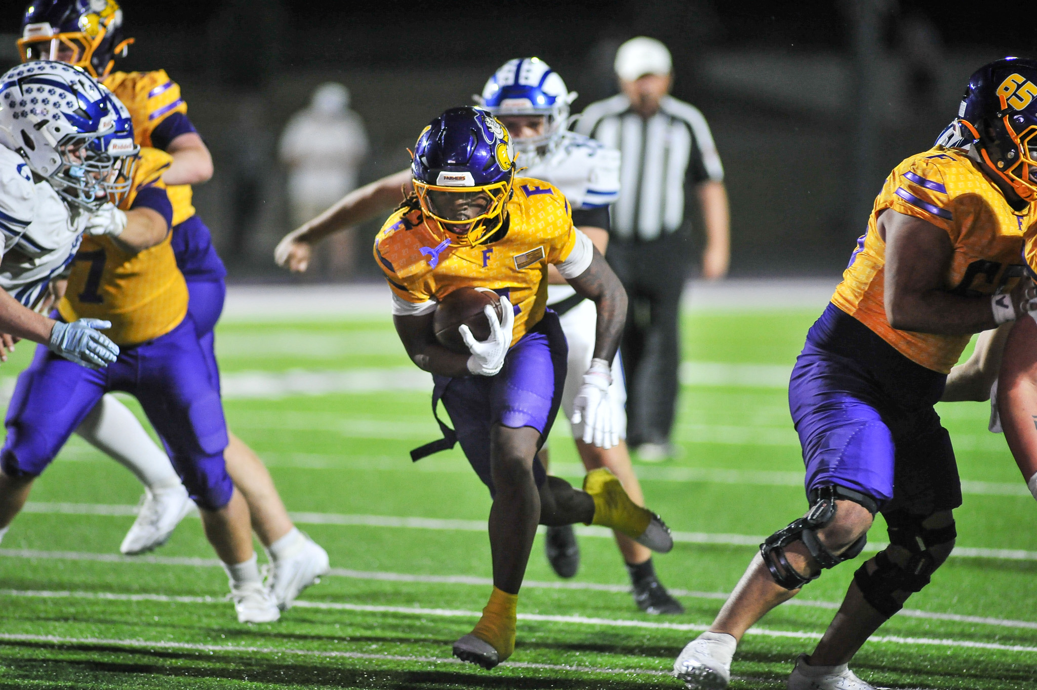 Farmers overwhelm Quinlan Ford, clinch playoff berth